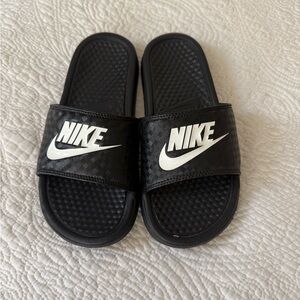 Nike Black Slip-On Slides with White Swoosh Detail